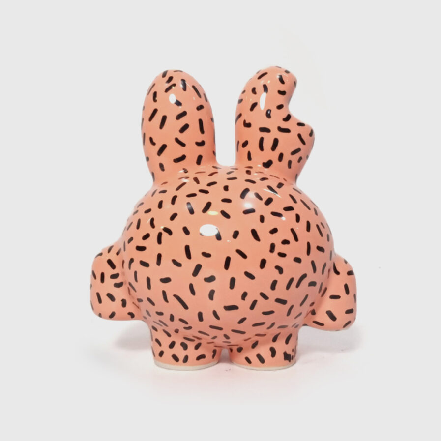 black and pink ceramic creature by ricardo milne