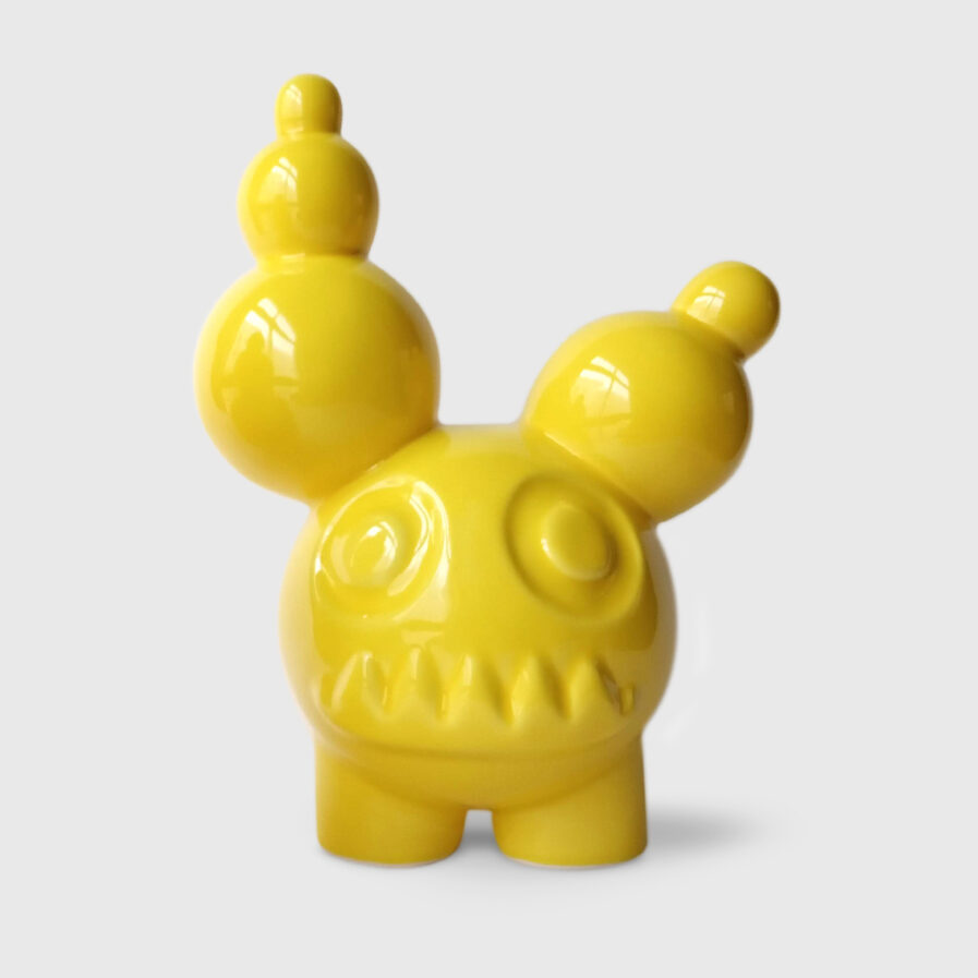 yellow ceramic creature by ricardo milne