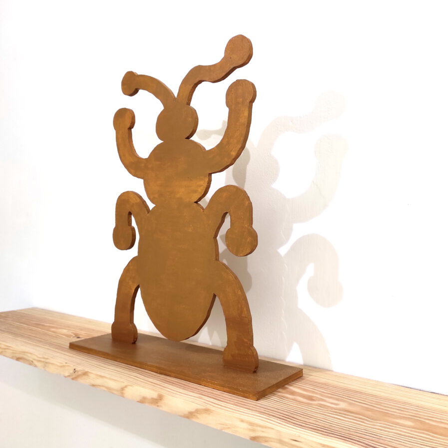 Brown wooden scarab by Amargo