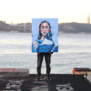 Someone holding a painting of young woman and a crow by Marita on a pier.