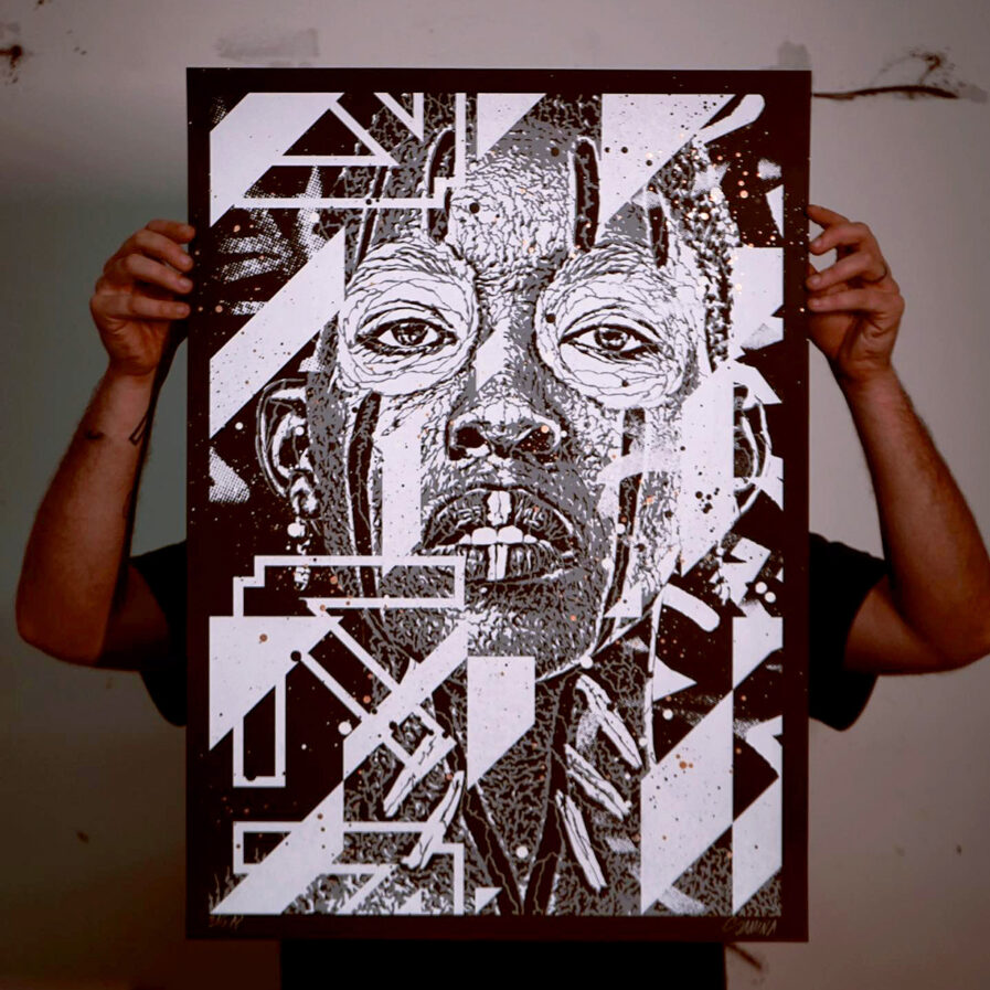 Someone holding a black and white illustration print by Samina