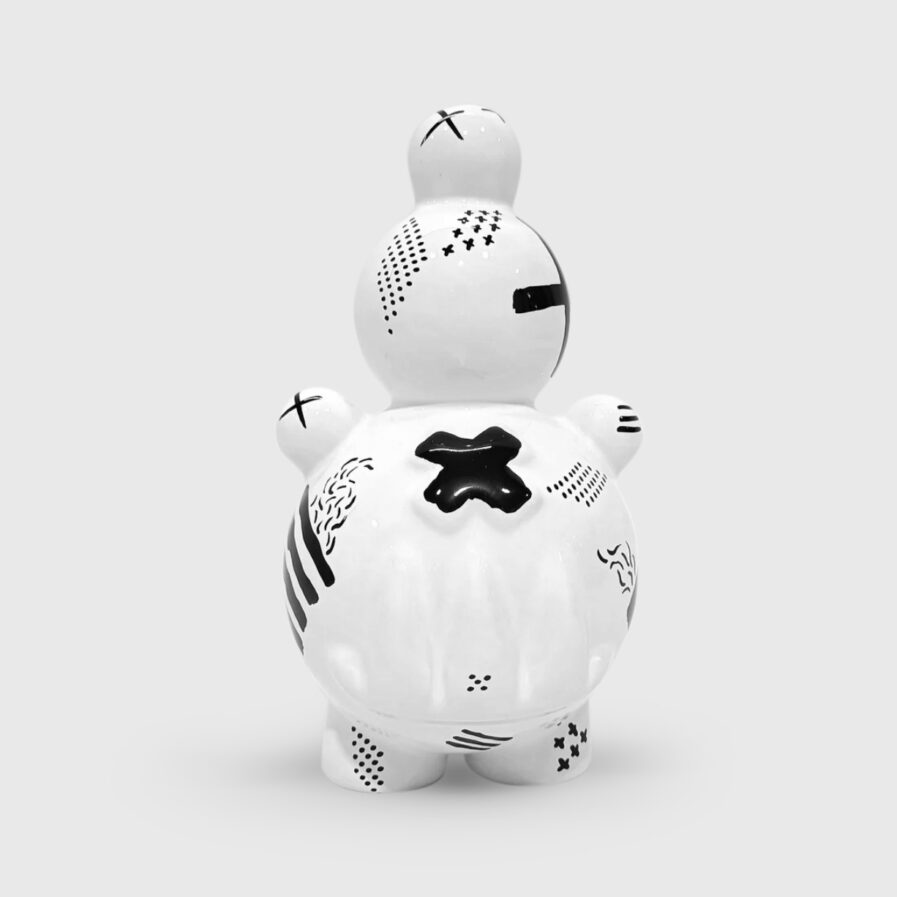 black and white ceramic creature by ricardo milne