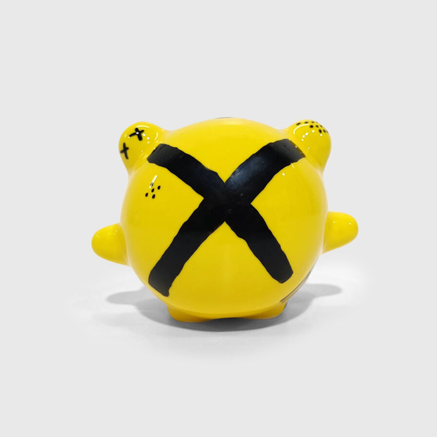 black and yellow ceramic creature by ricardo milne