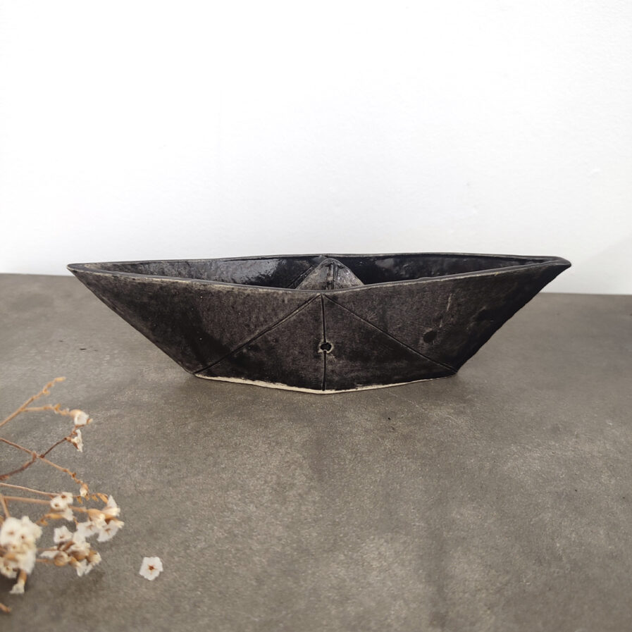 Black ceramic paperboat
